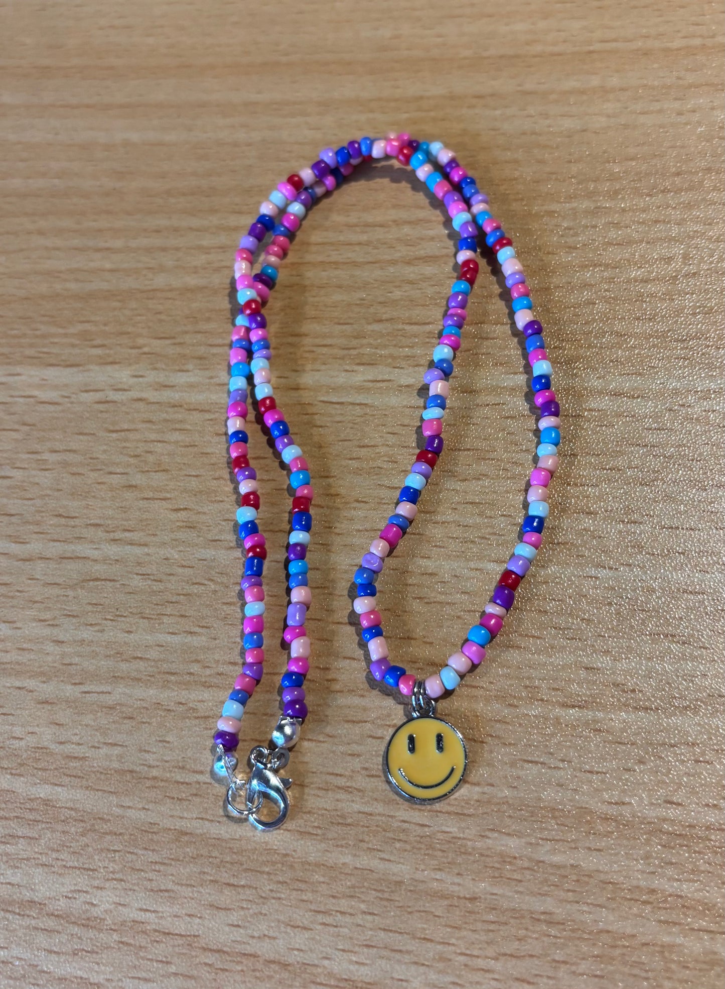 Girls yellow smiley face necklace